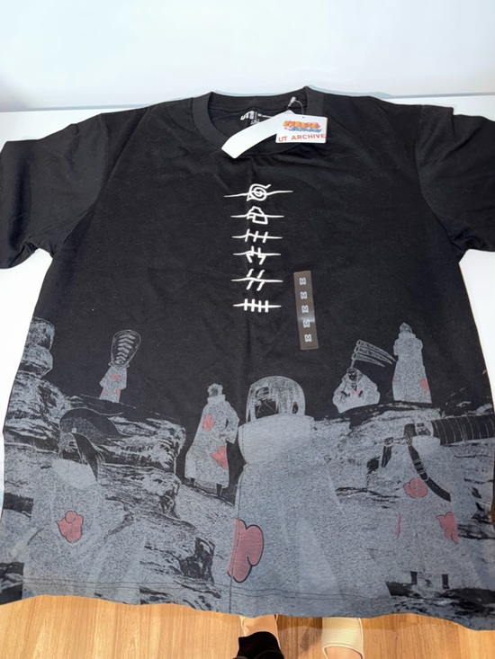 Uniqlo Other - Uniqlo Black Short-Sleeve Graphic Tee with Red Accents